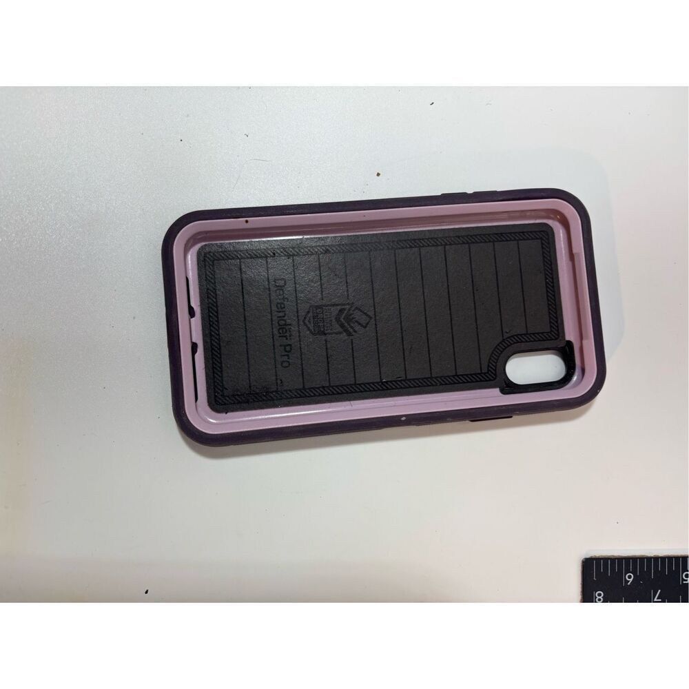 OtterBox Defender Pro case in purple with light pink accents. Designed for iPhon